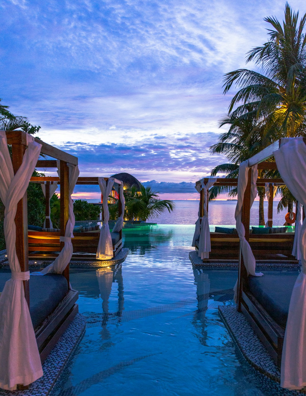 OpenStays + Razorpay 5 Beach resort cabana at dusk
