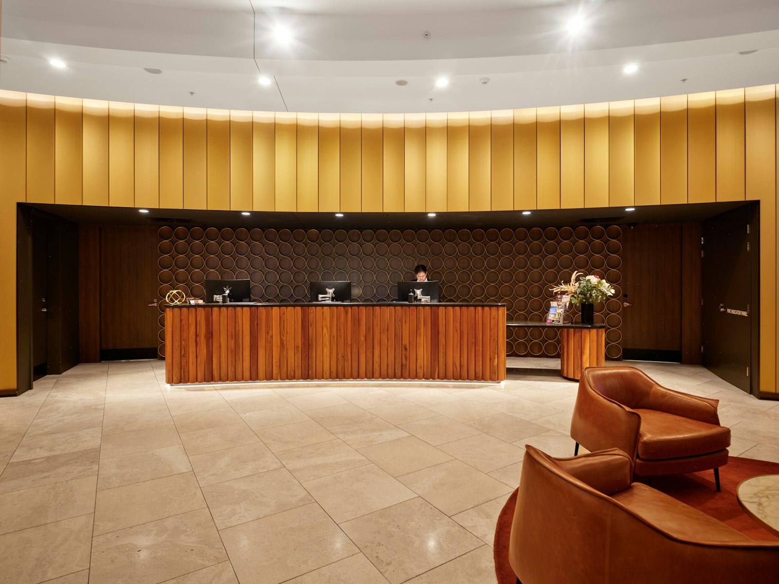 Rate Parity Strategy for Hotels 1 Hotel reception desk, representing a rate parity strategy for direct bookings