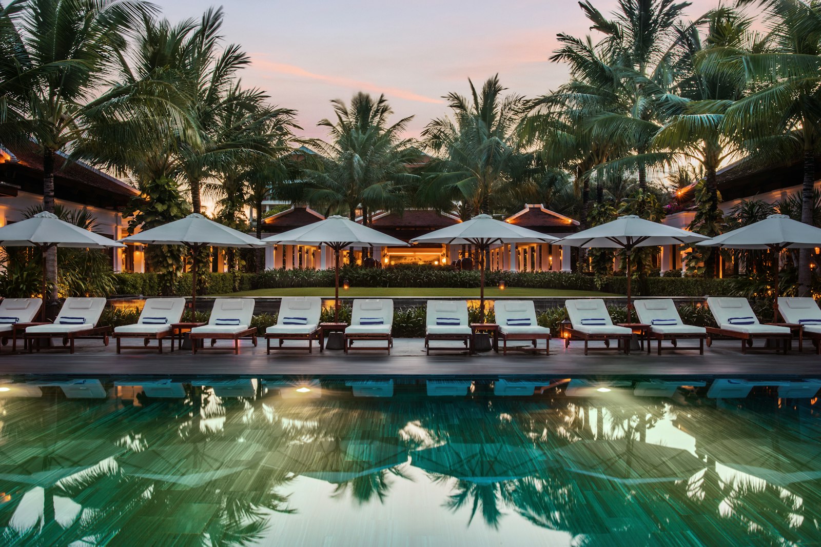 A resort swimming pool and lounger area, a facility expected at 5-star classification