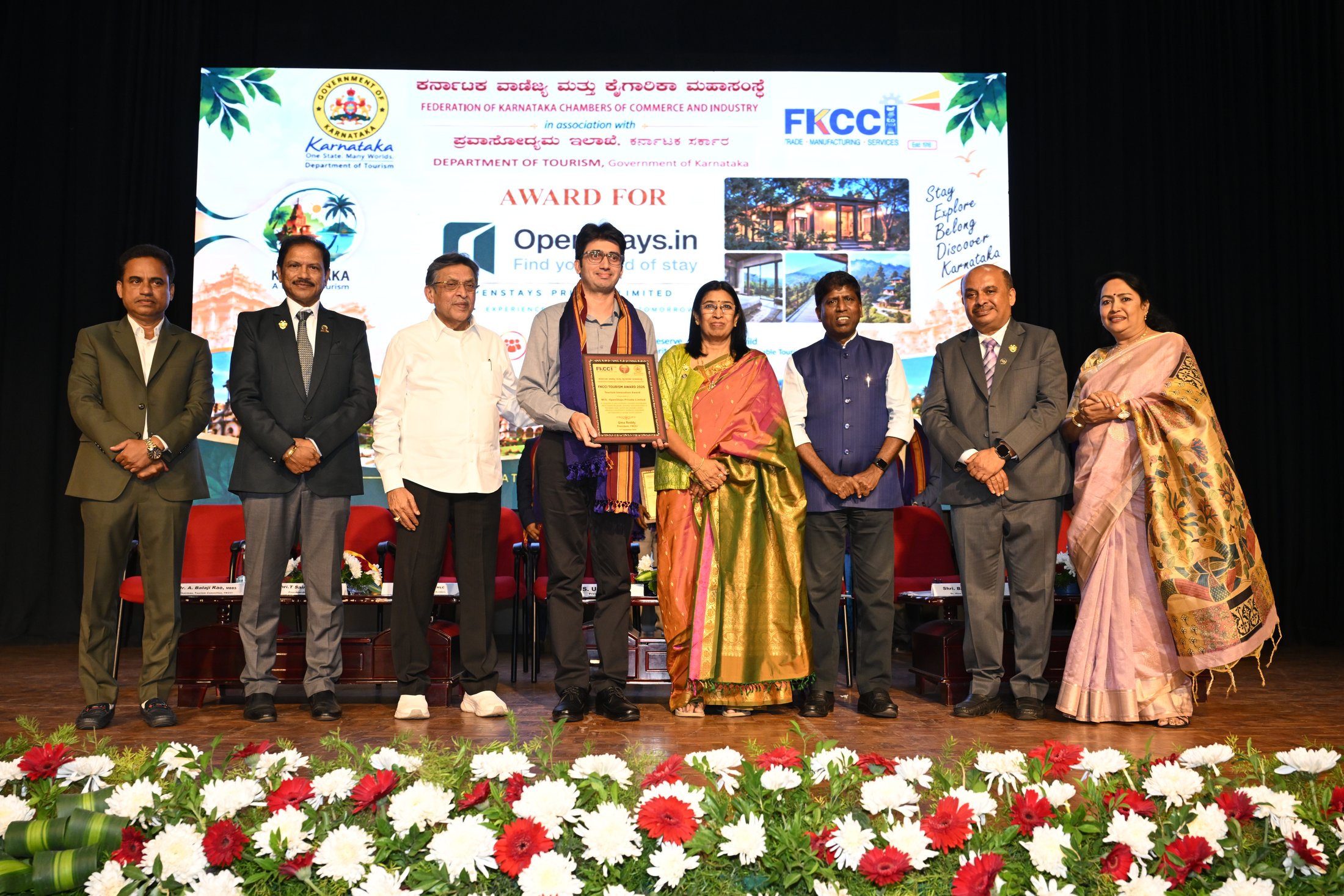 Press 3 OpenStays receiving the Tourism Innovation Award at the FKCCI Tourism Convention 2026